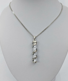 Dije tipo mezuza espiral